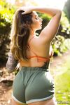 Thick female Paige Turnah exposes her tits in the backyard w